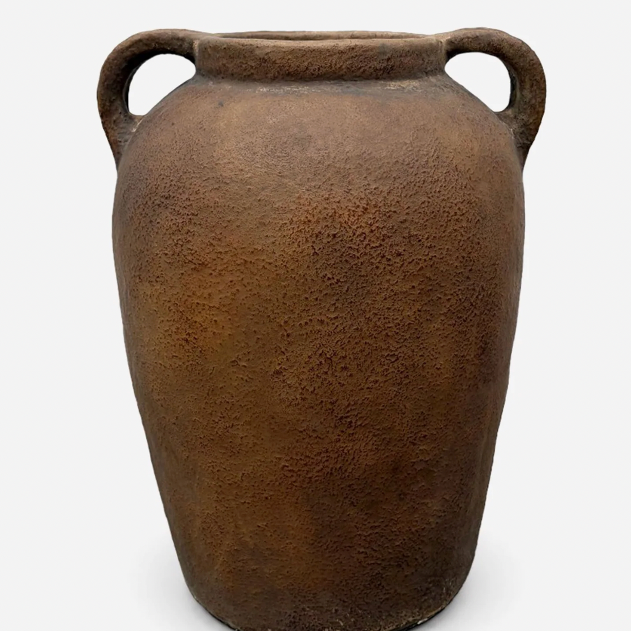 Brown ceramic vase with two handles on a white background