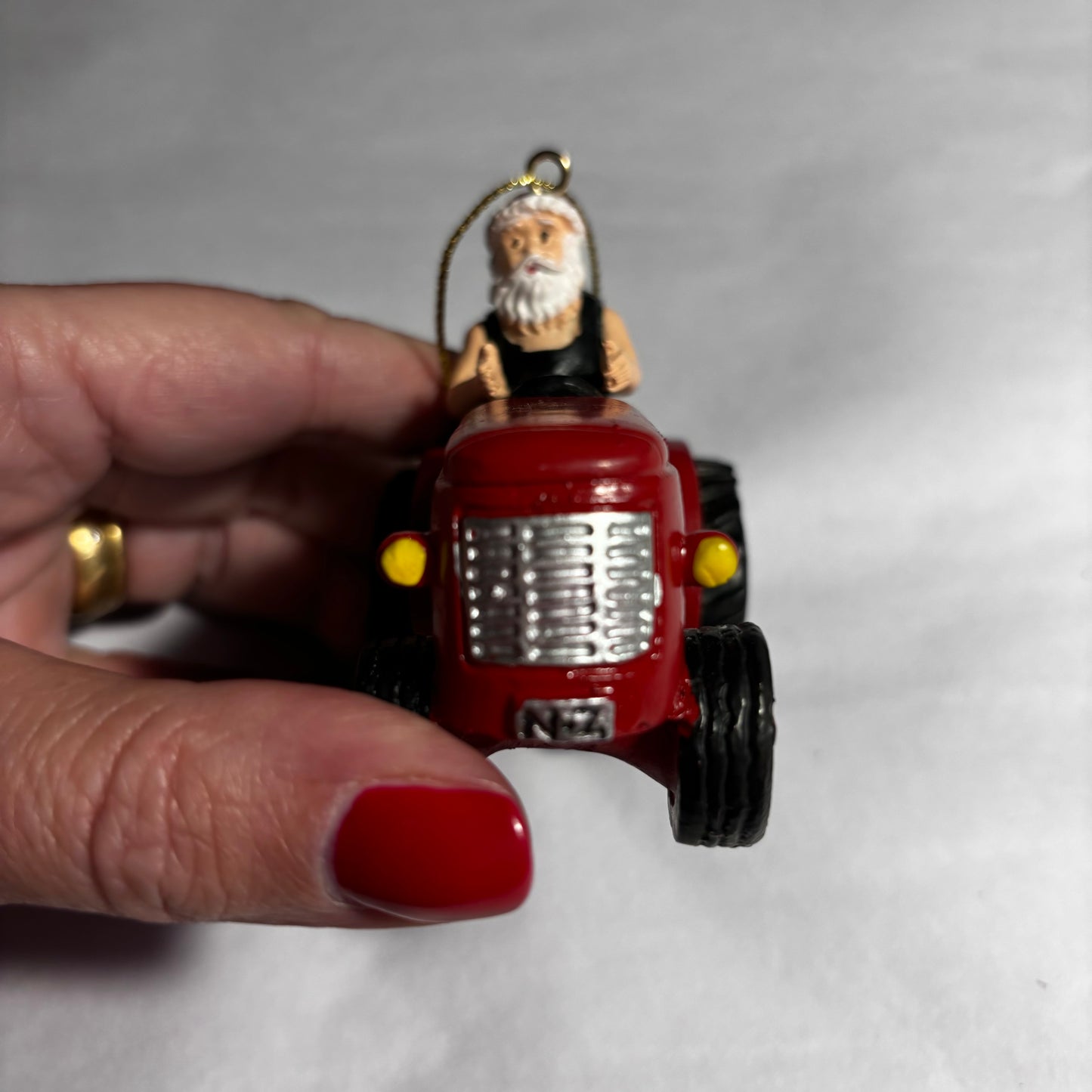 Santa on a Tractor Christmas Decoration