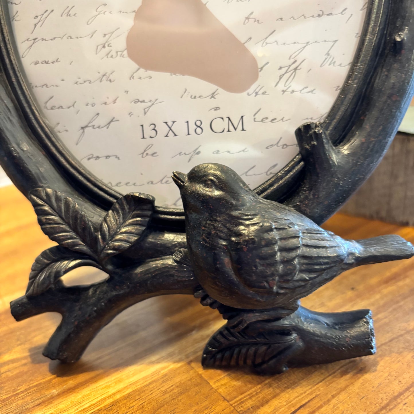 Ornate Oval Photo Frame with a bird