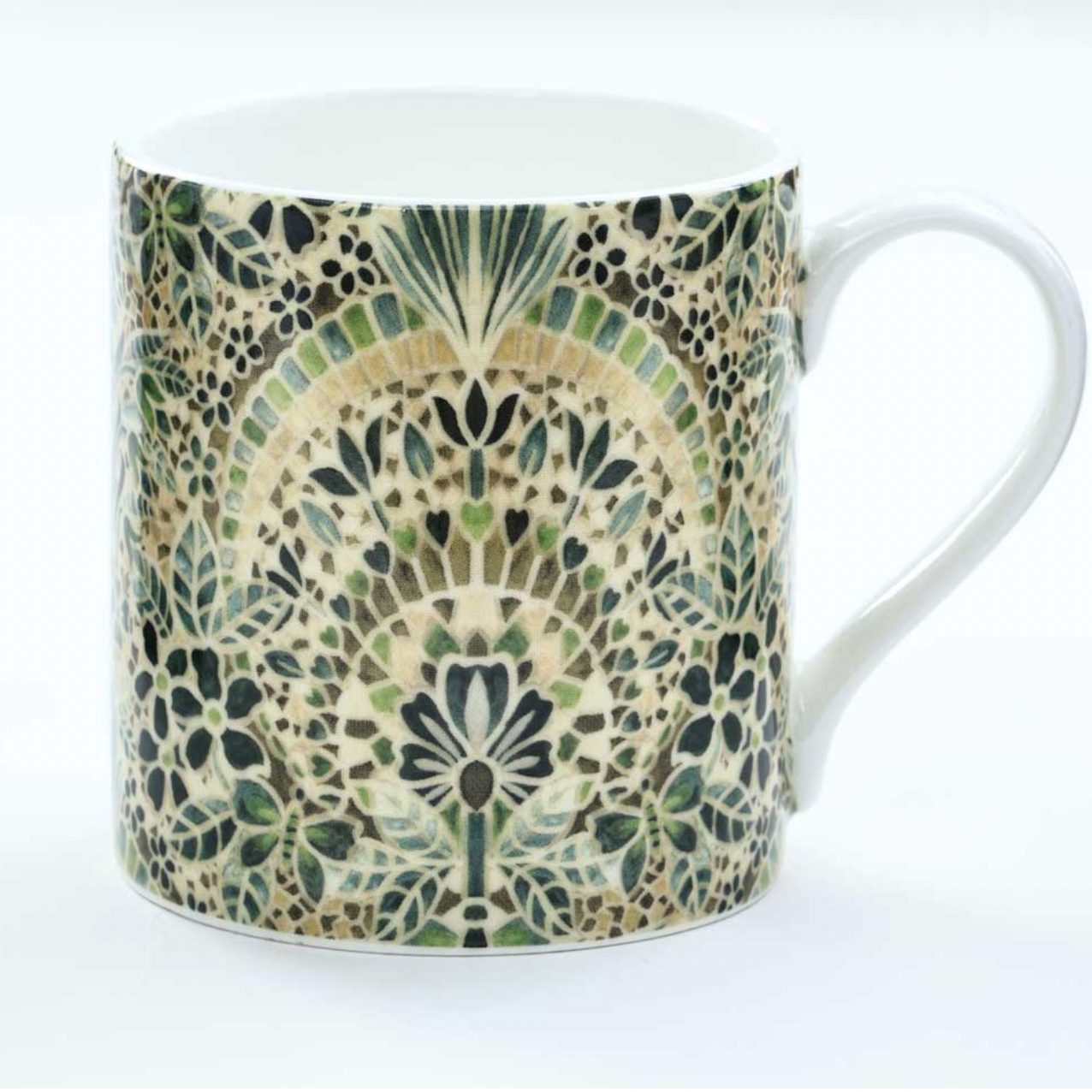 Mug with a decorative green and beige pattern on a white background
