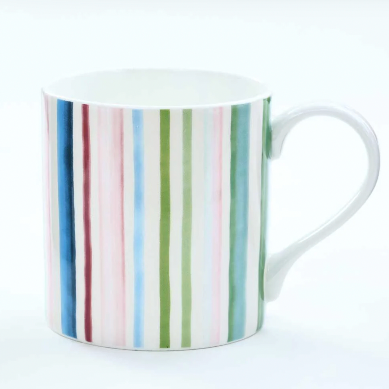 Striped mug with multicolor pattern on a white background