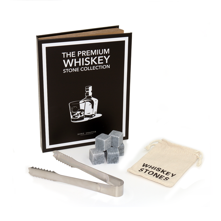 Premium whiskey stone collection with stones, tongs, and branded pouch on a white background