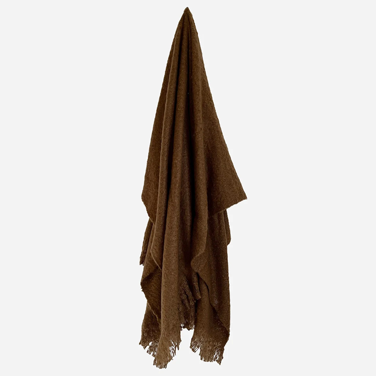 Brown shawl draped over a white background