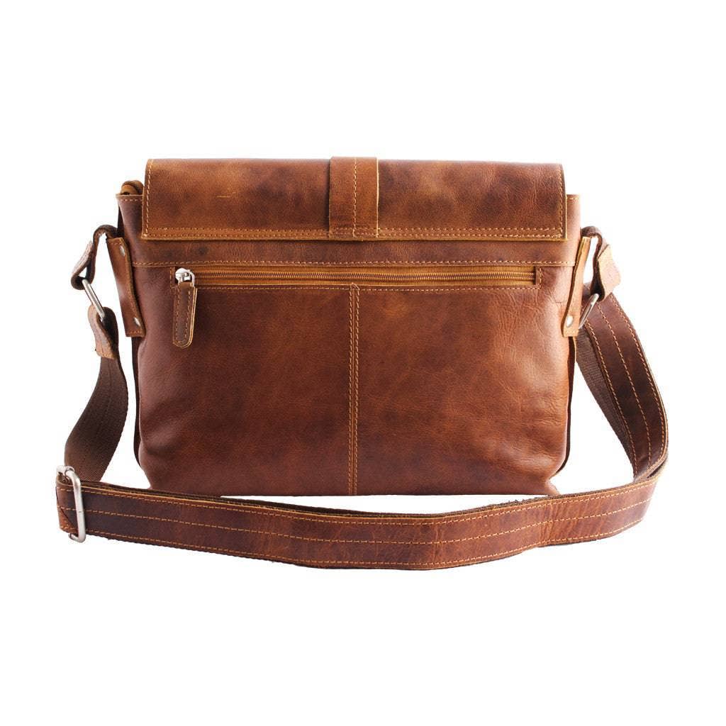 Brown leather shoulder bag on a white background