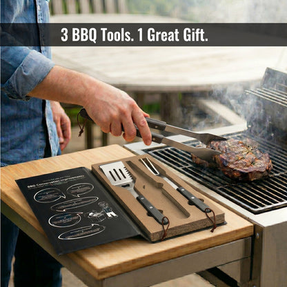 Person grilling with a set of BBQ tools on a wooden cutting board next to a grill.