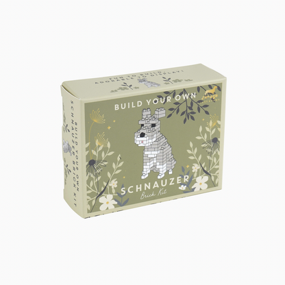 Box for building a mosaic dog sculpture with floral design