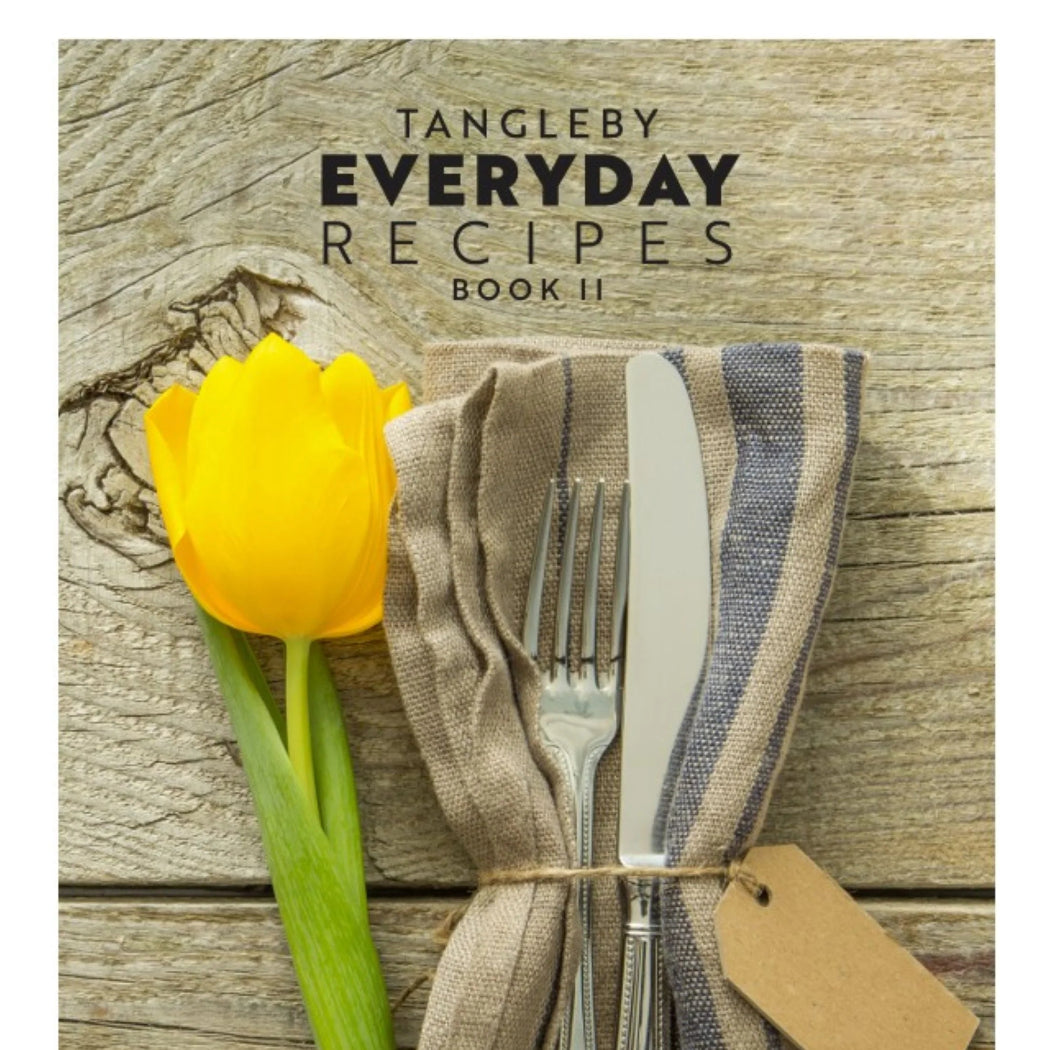 Cookbook cover titled 'Tangleby Everyday Recipes Book II' with a yellow tulip and cutlery on a wooden background.