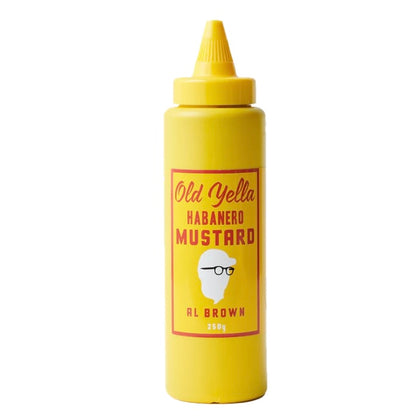 A yellow squeeze bottle labeled 'Old Yella Habanero Mustard' by Al Brown.