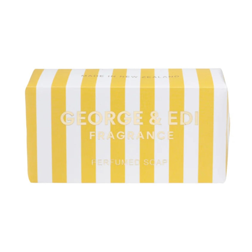 Striped soap packaging with 'George & Edi Fragrance' text on a white background