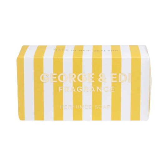 Striped soap packaging with 'George & Edi Fragrance' text on a white background