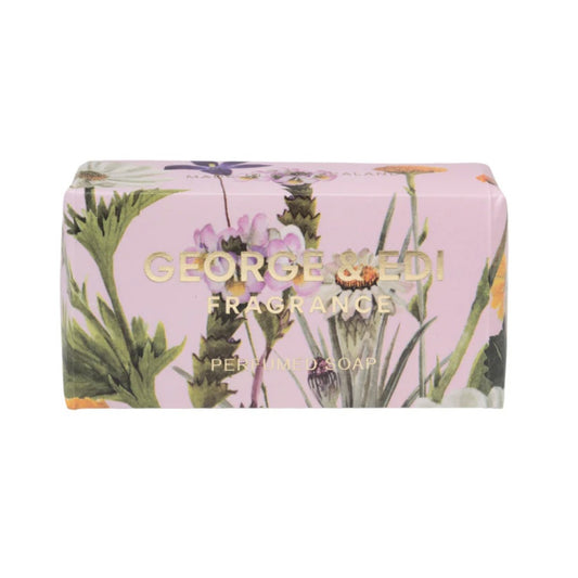 Bar of soap with floral design and 'George & Edi' branding on a white background