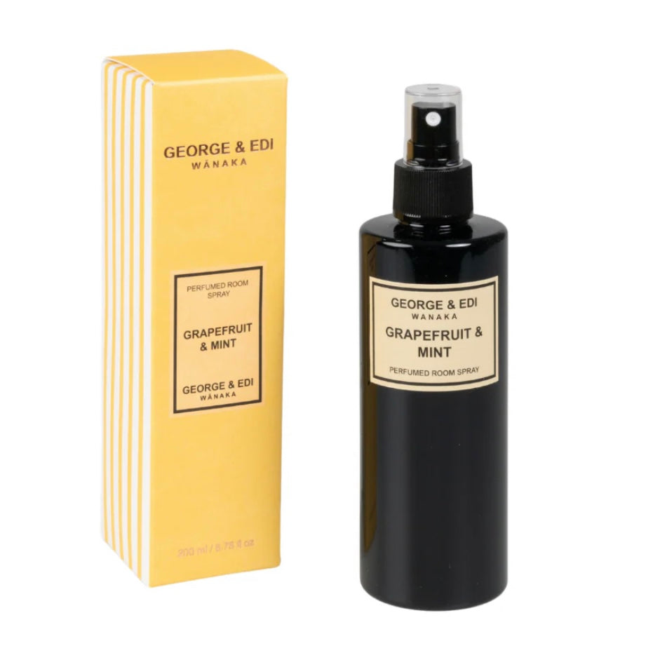 Perfumed room spray bottle and packaging with 'George & Edi Wanaka' branding on a white background.