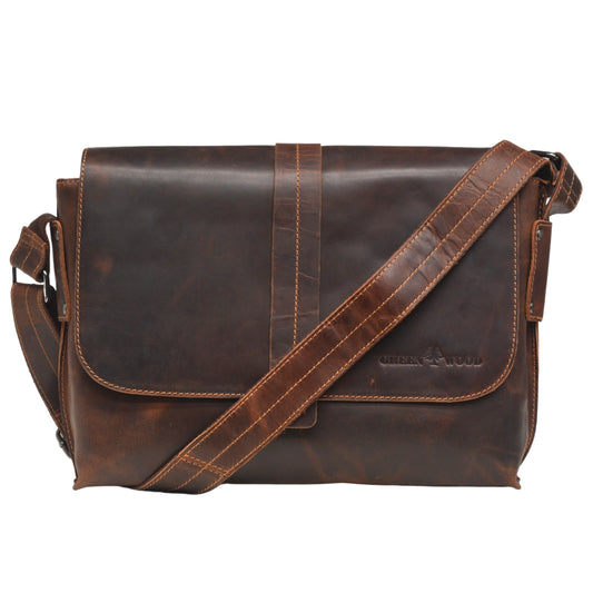 Brown leather satchel bag on a white background