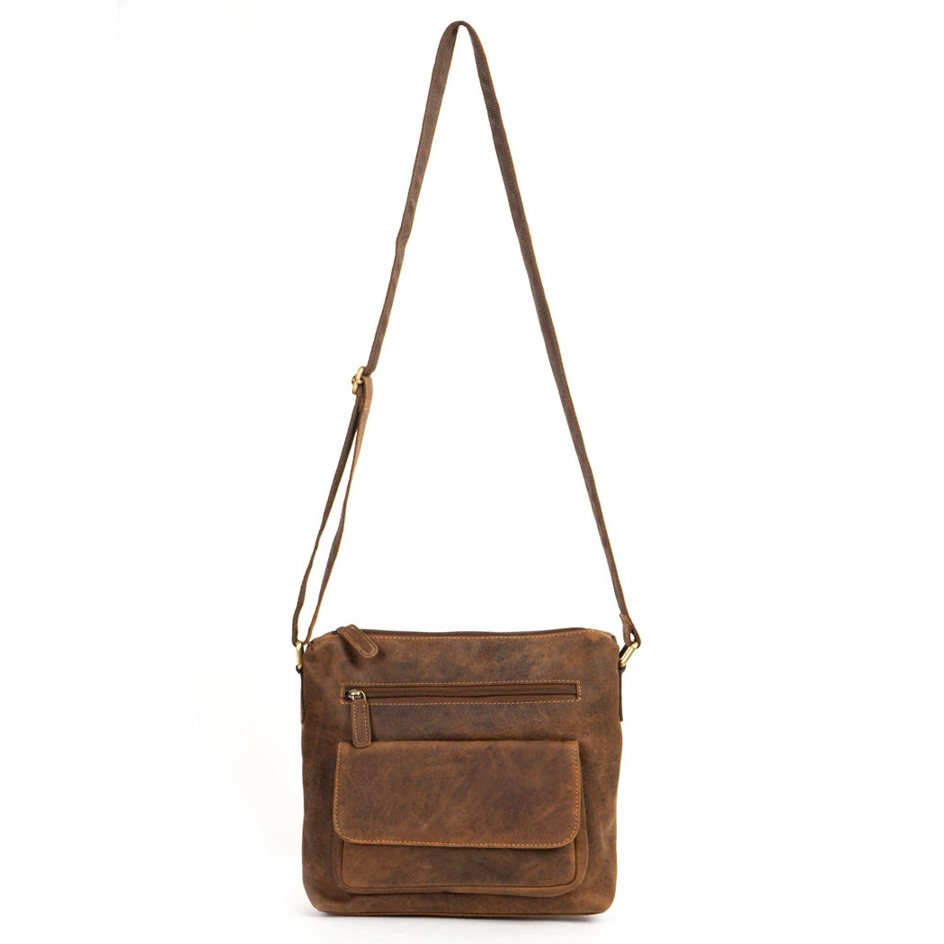 Brown leather crossbody bag on a white background