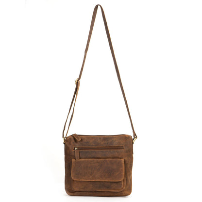 Brown leather crossbody bag on a white background