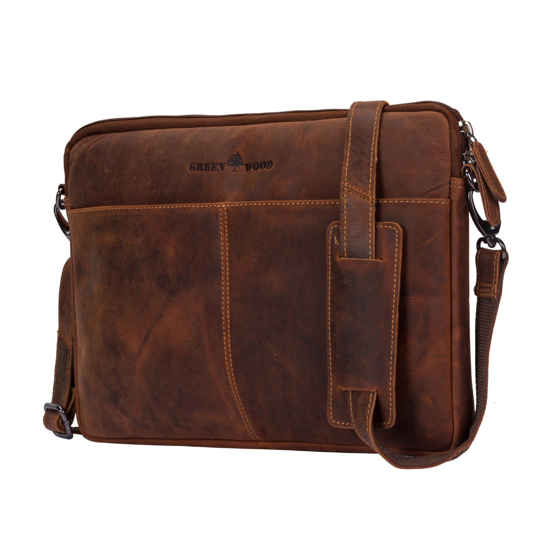 A brown leather messenger bag with a front pocket, a vertical strap detail, and a detachable shoulder strap, shown on a plain white background. The brand name 'GREENWOOD' is printed on the front.