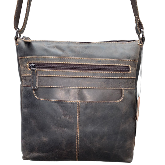Dark brown leather crossbody bag on a white background