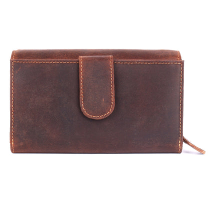 Brown leather wallet with a strap on a white background