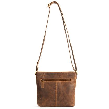 Brown leather crossbody bag on a white background