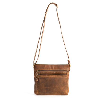 Brown leather crossbody bag on a white background