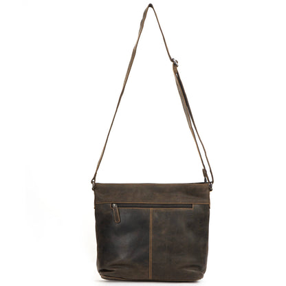A dark brown distressed leather crossbody bag with a long adjustable shoulder strap, a front zippered pocket, and contrast stitching, shown against a plain white background.