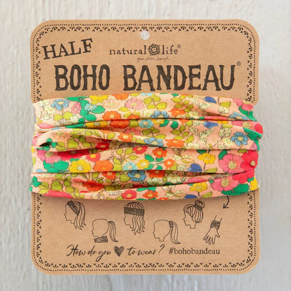 Floral headbands on a branded cardboard backing with 'Half Boho Bandeau' text.