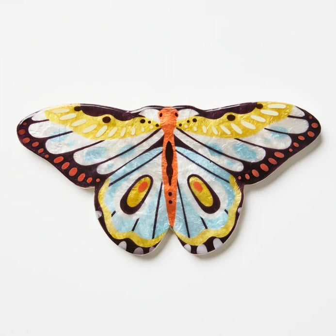 Colorful butterfly-shaped object on a white background