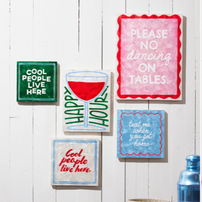 Jones & Co product page with decorative signs and a table setting on a white background