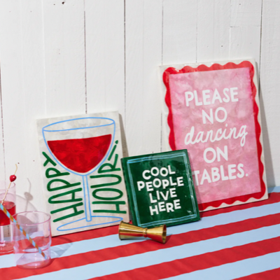 Decorative signs on a red and white striped surface with 'Jones & Co' branding.
