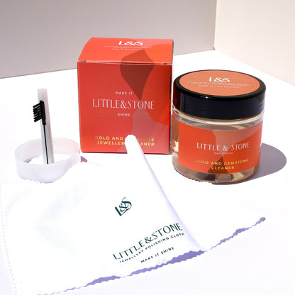 Little & Stone makeup products including a jar, box, and brush on a white surface.