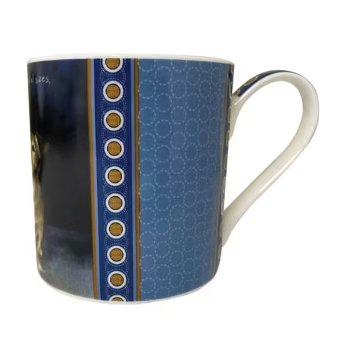 Mug with blue patterned design on a white background