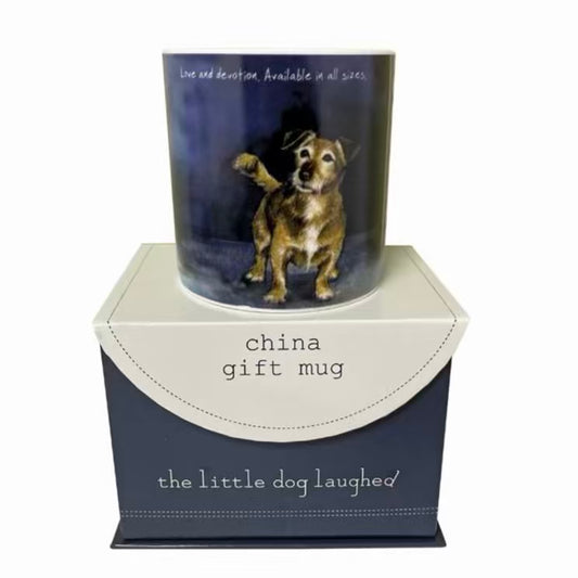 Gift mug with a dog illustration in a decorative box labeled 'the little dog laughed'.