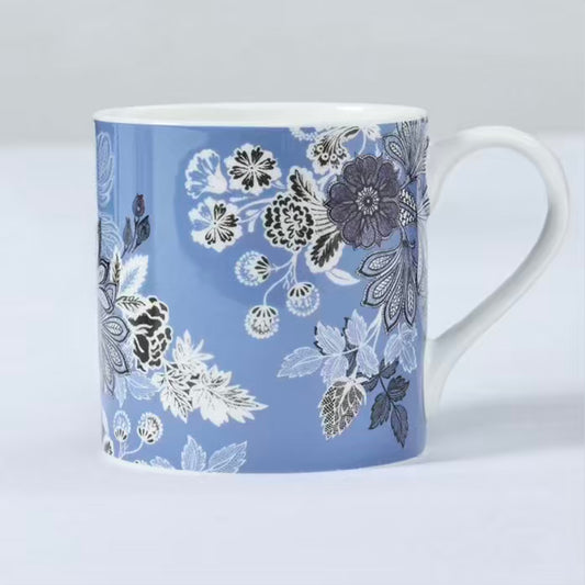 Mug with floral pattern on a light blue background