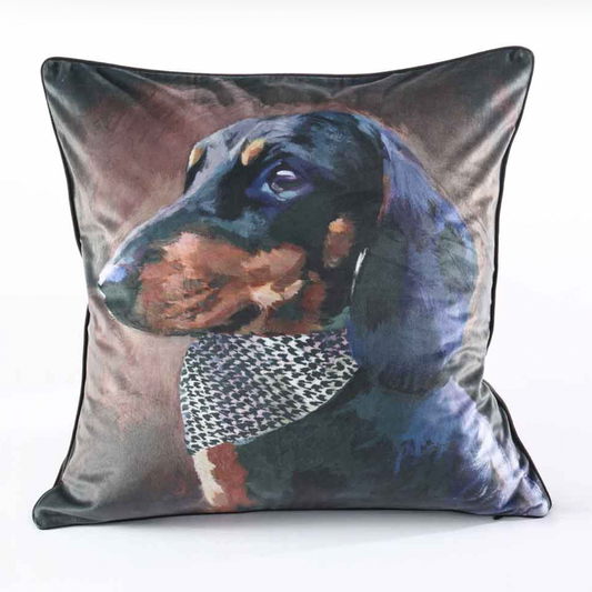 Pillow with a dachshund dog wearing a bandana on a white background
