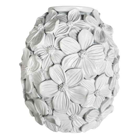 Decorative white vase with floral patterns on a white background