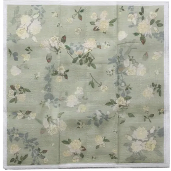 Floral patterned fabric on a light green background
