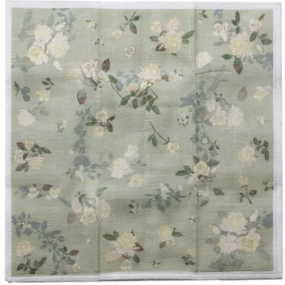 Floral patterned fabric on a light green background