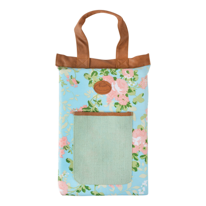 Rose print kneeling pad with front pocket in green and leather handles