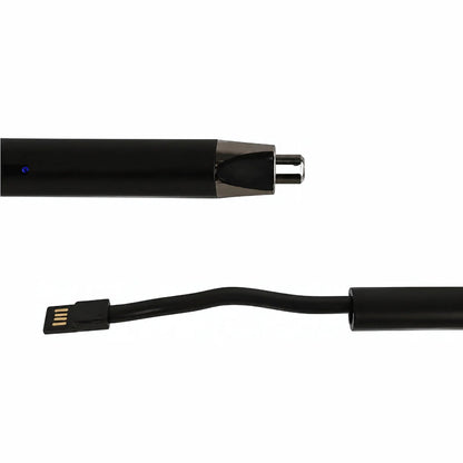 A close-up studio shot of a black cylindrical electronic device with a small blue indicator light and metallic connector, shown alongside its attached black cable on a plain white background.