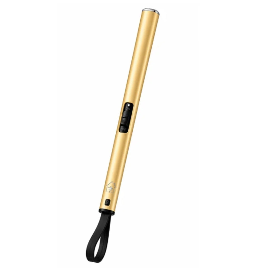 A sleek, metallic gold personal lighter with a black wrist strap and black control buttons, shown diagonally on a solid white background.
