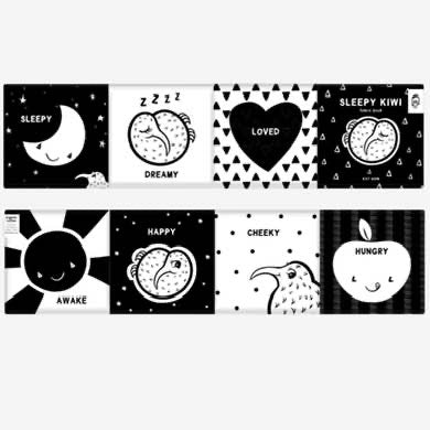 Set of black and white cloth pages with various illustrations and text on a white background
