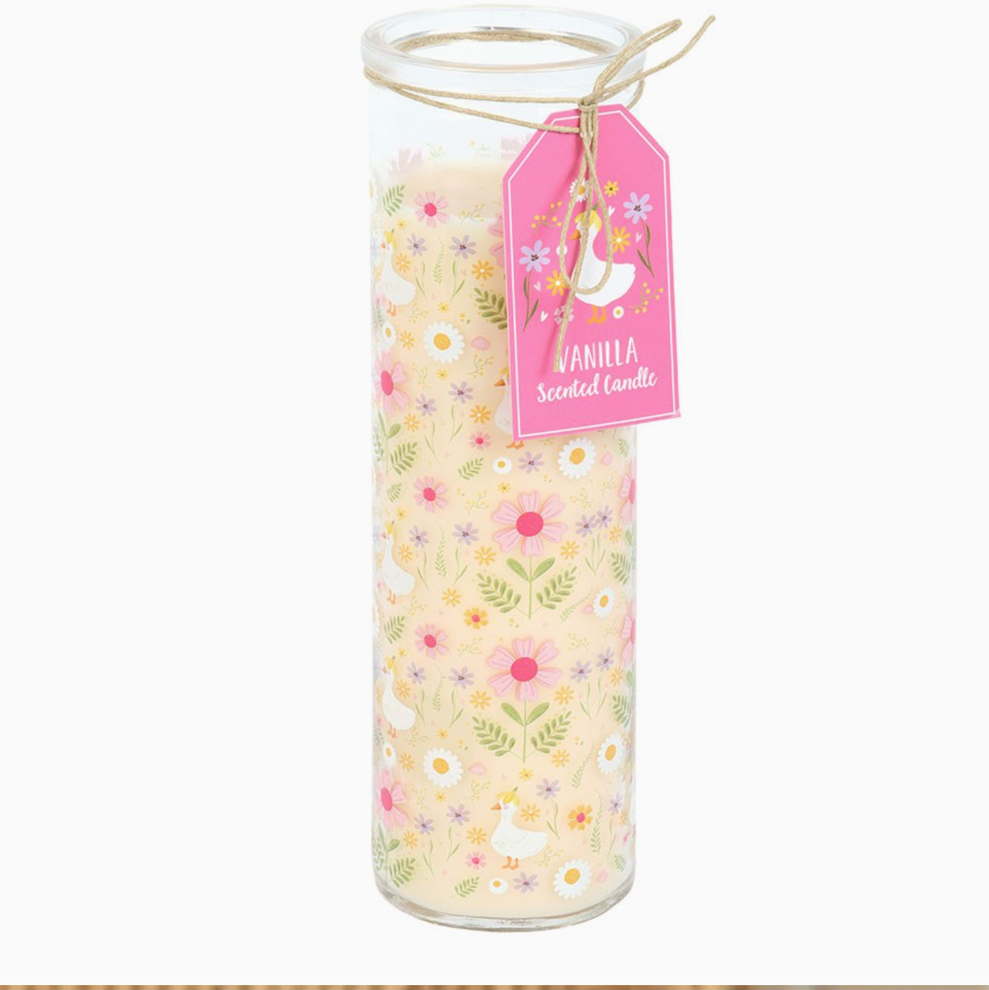 Decorative candle with floral pattern and pink tag on a white background