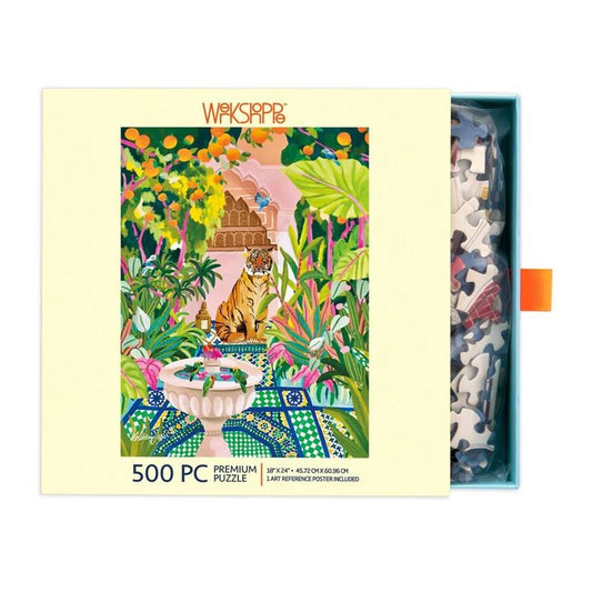 Jigsaw puzzle with a colorful design of a tiger in a garden, partially assembled, in a box.