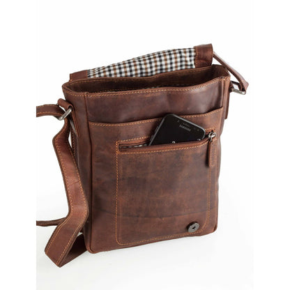 Brown leather bag with a pocket on a white background
