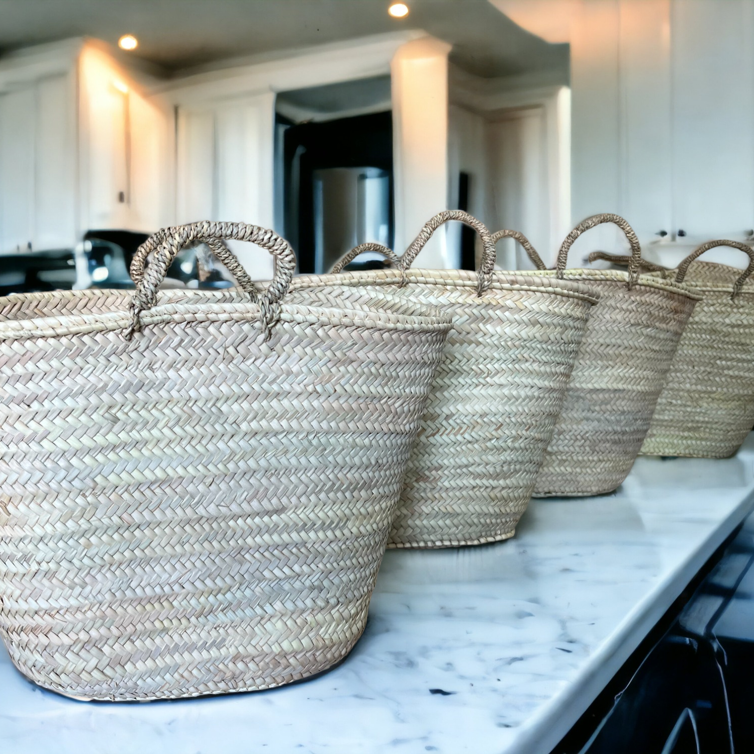 Set of woven baskets on a kitchen counter