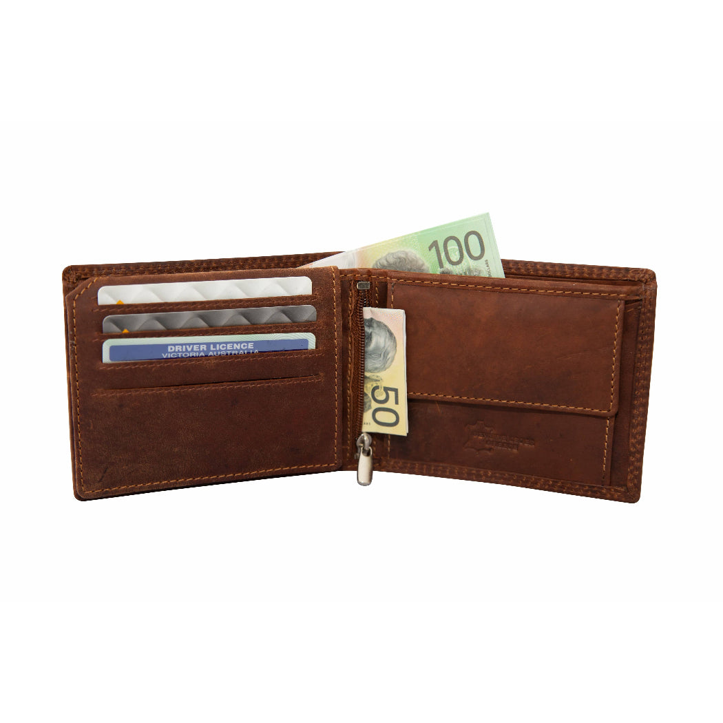 Brown leather wallet with money and cards on a white background