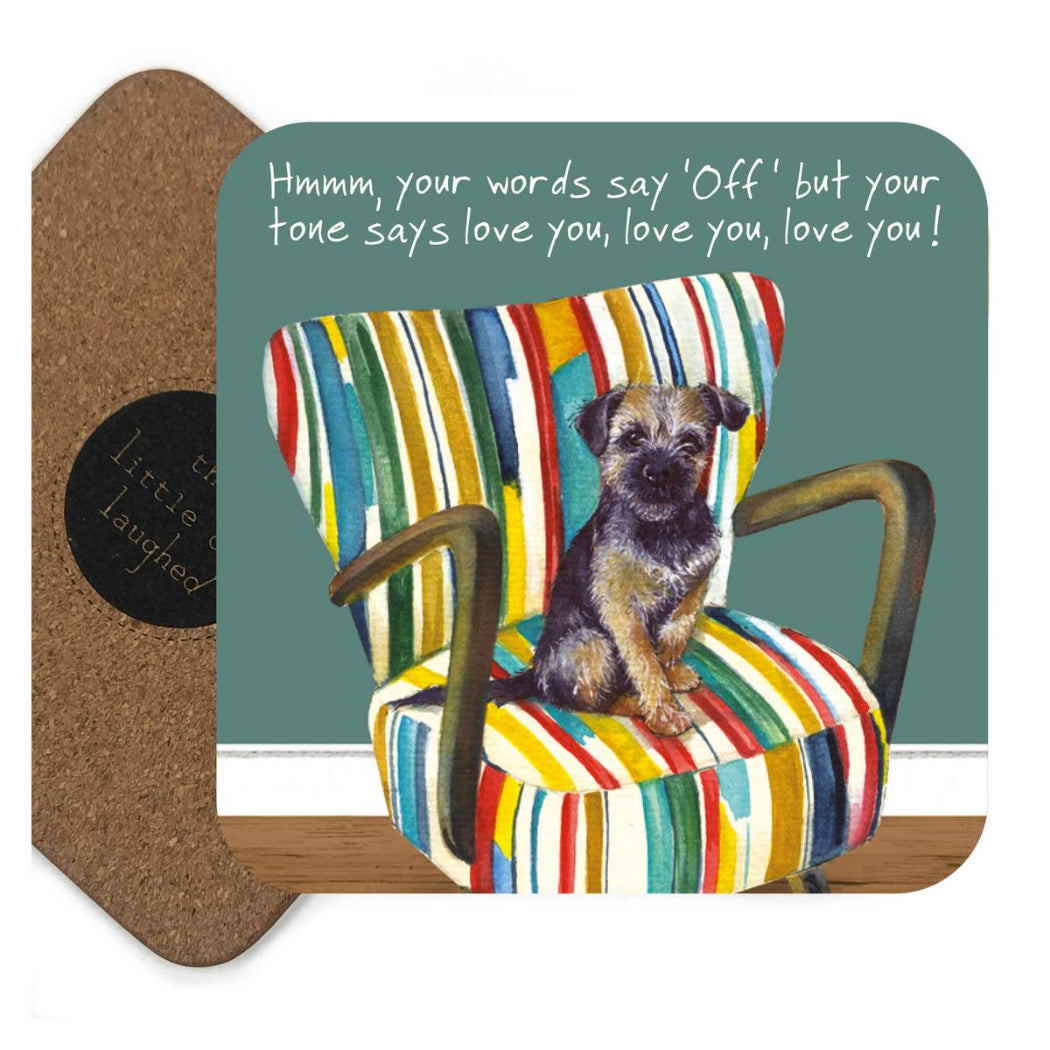 Card with a dog on a colorful striped chair and humorous text, with a cork backer.