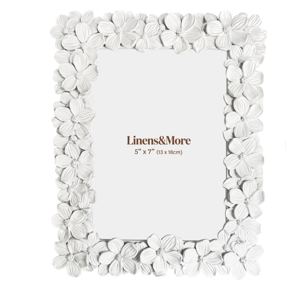 White floral photo frame with 'Linens&More' branding on a white background