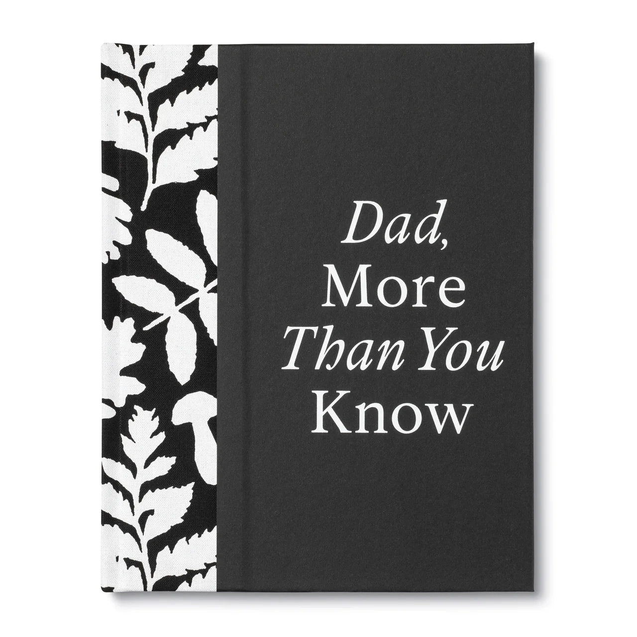 A hardcover book or journal with a black cover featuring the white text 'Dad, More Than You Know' and a black-and-white botanical leaf pattern spine panel, shown on a white background.