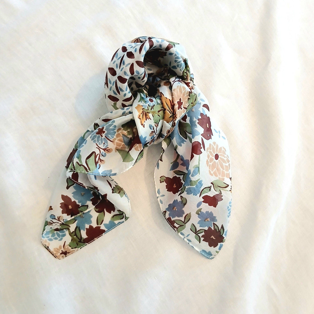Floral patterned scarf on a light background
